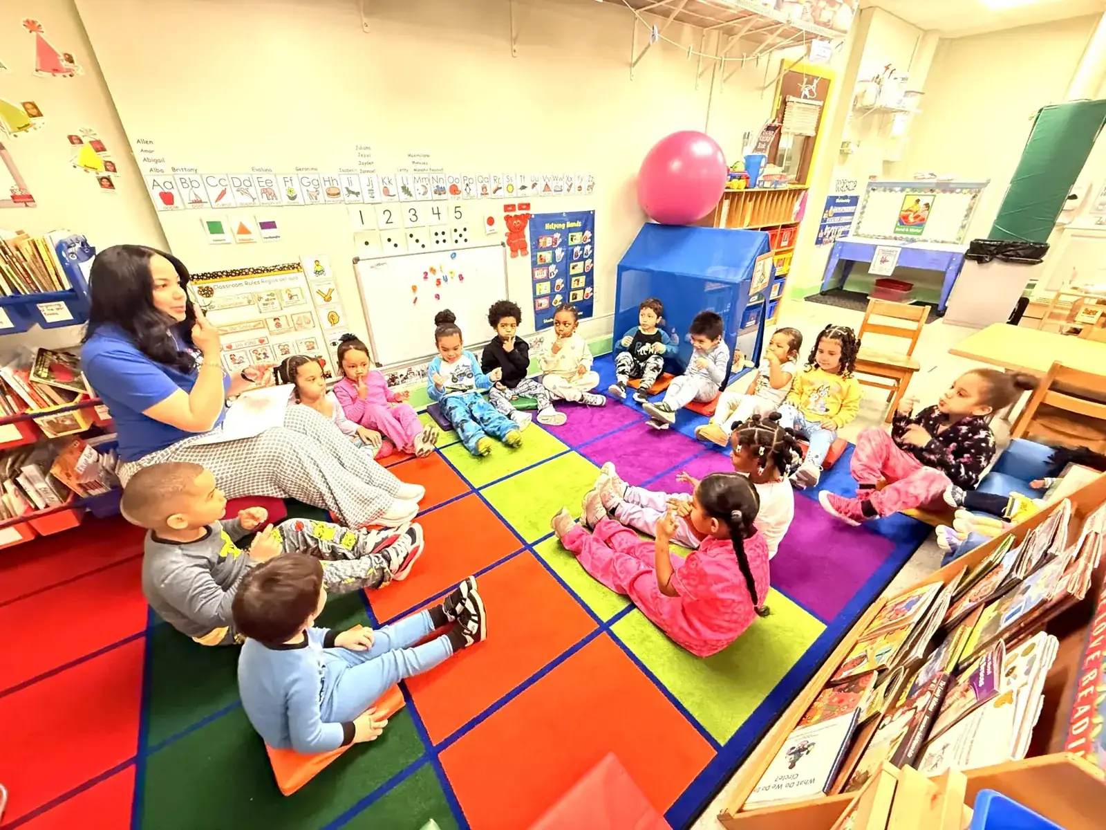 Teacher leading circle time at PDC100 preschool