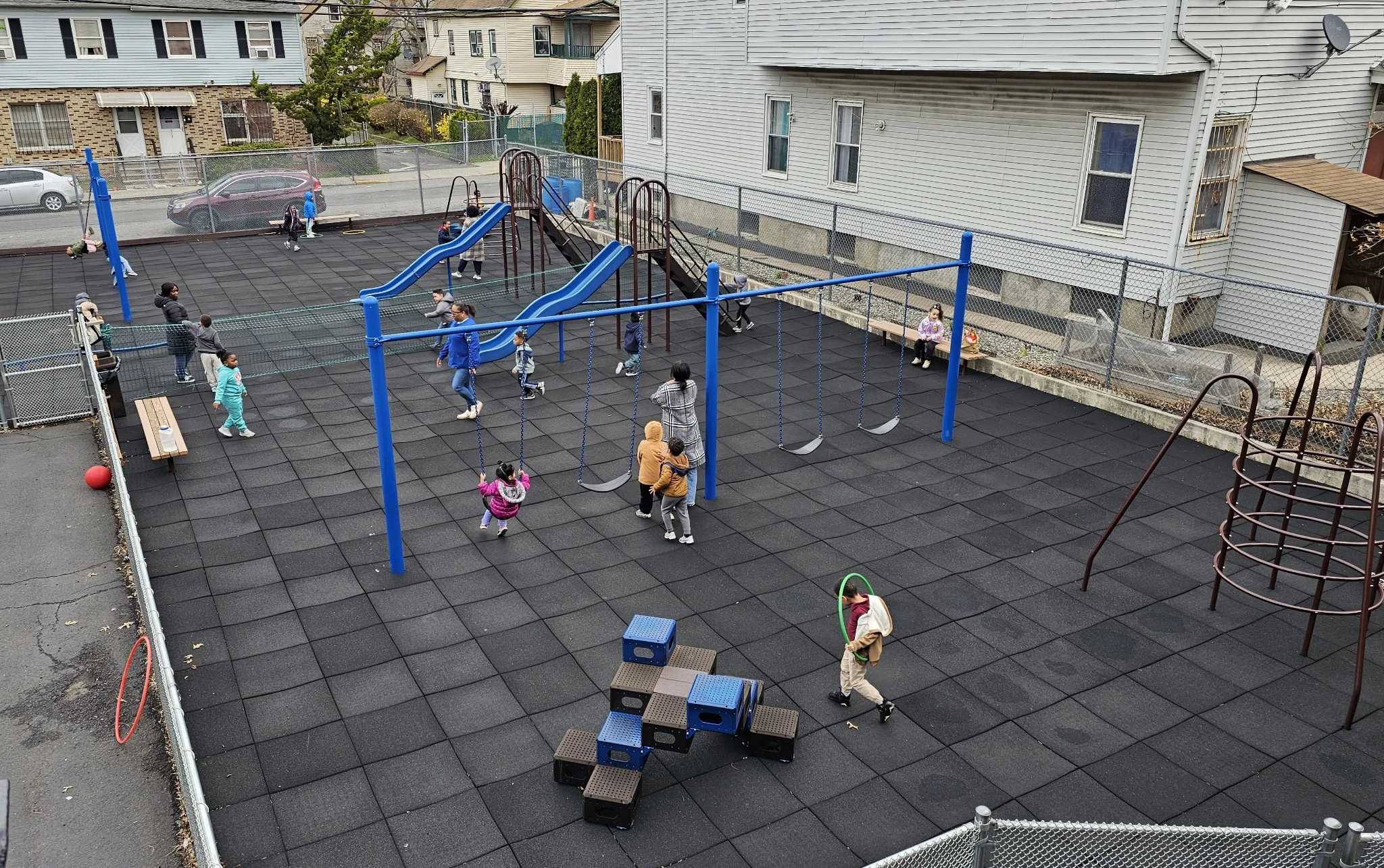 Children playing on the playground at PDC100